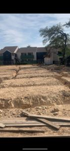 Trenching out for plumbing rough-in for 16 unit multifamily building 2